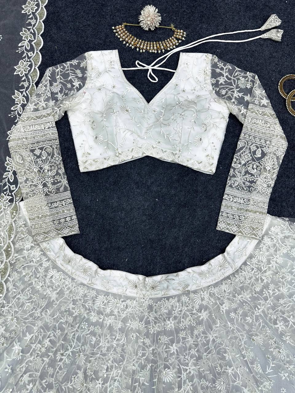 Wedding Wear Soft Net Embroidered Lehenga Choli By WTW