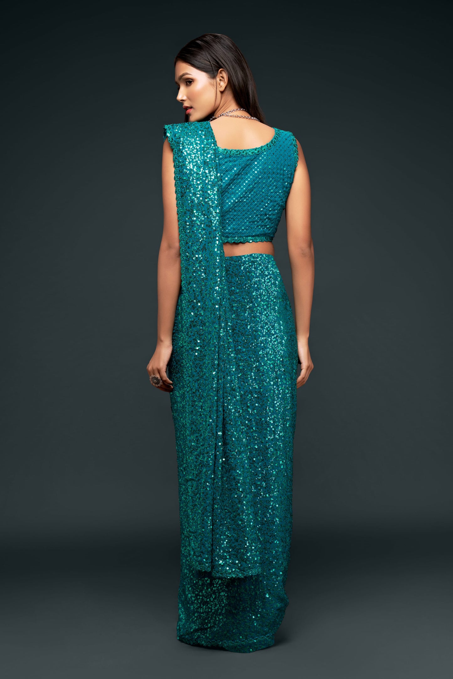 Attractive Teal Blue Sequined Georgette Party Wear Saree By WTW