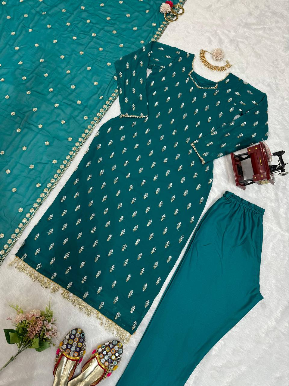 Grand Peacock Green Georgette Fancy Lace Border Salwar Suit By WTW