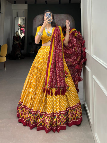 Yellow Tussar Silk Lehenga Choli With Leheriya Print, Patola Border & Bandhani Dupatta By WTW