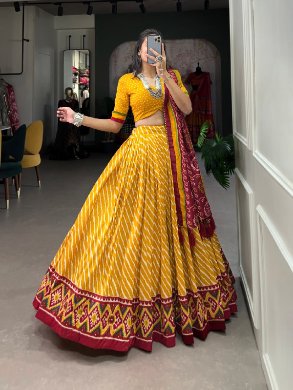 Yellow Tussar Silk Lehenga Choli With Leheriya Print, Patola Border & Bandhani Dupatta By WTW