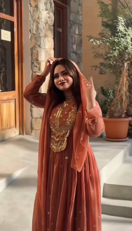 Light Orange Faux Georgette Sequence Work Gown By WTW