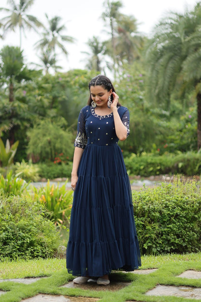 Party Wear Teal Blue Faux Blooming With Embroidery Zari Sequence Work Designer Gown By WTW