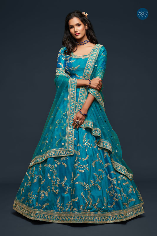 Teal Blue Thread Embroidery Art Silk Wedding Wear Lehenga Choli By WTW