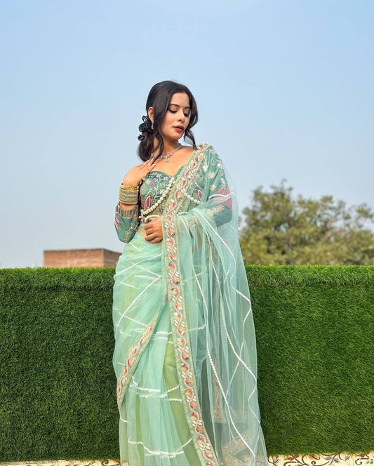 Peacock Blue Colour Pearl Work Designer Net Saree By WTW